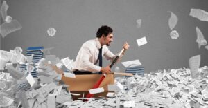 Man paddling in a sea of sheets Representing Multitasking DIY